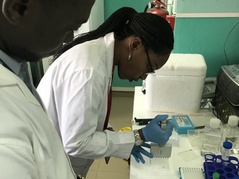 Dr Aminatou Kone prepares samples for genomic sequencing at the University of Bamako